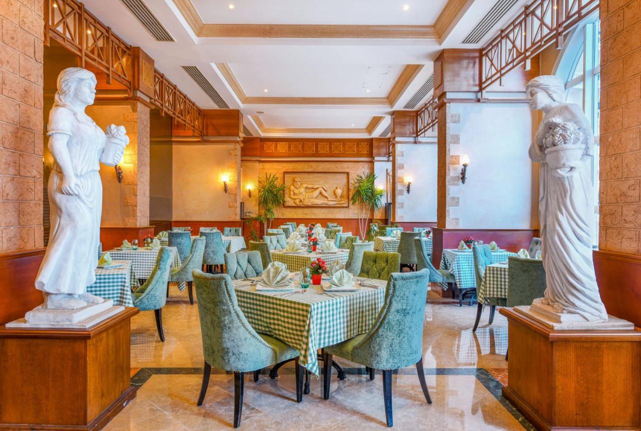 亚历山大托里普酒店 亚历山大港 外观 照片 The restaurant's interior